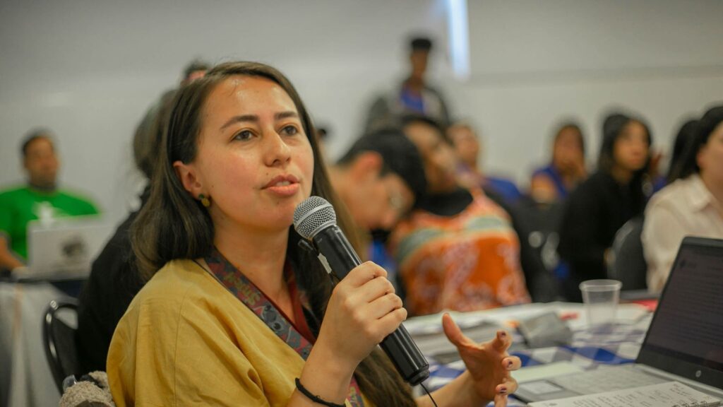 A young woman contributing to a discussion
