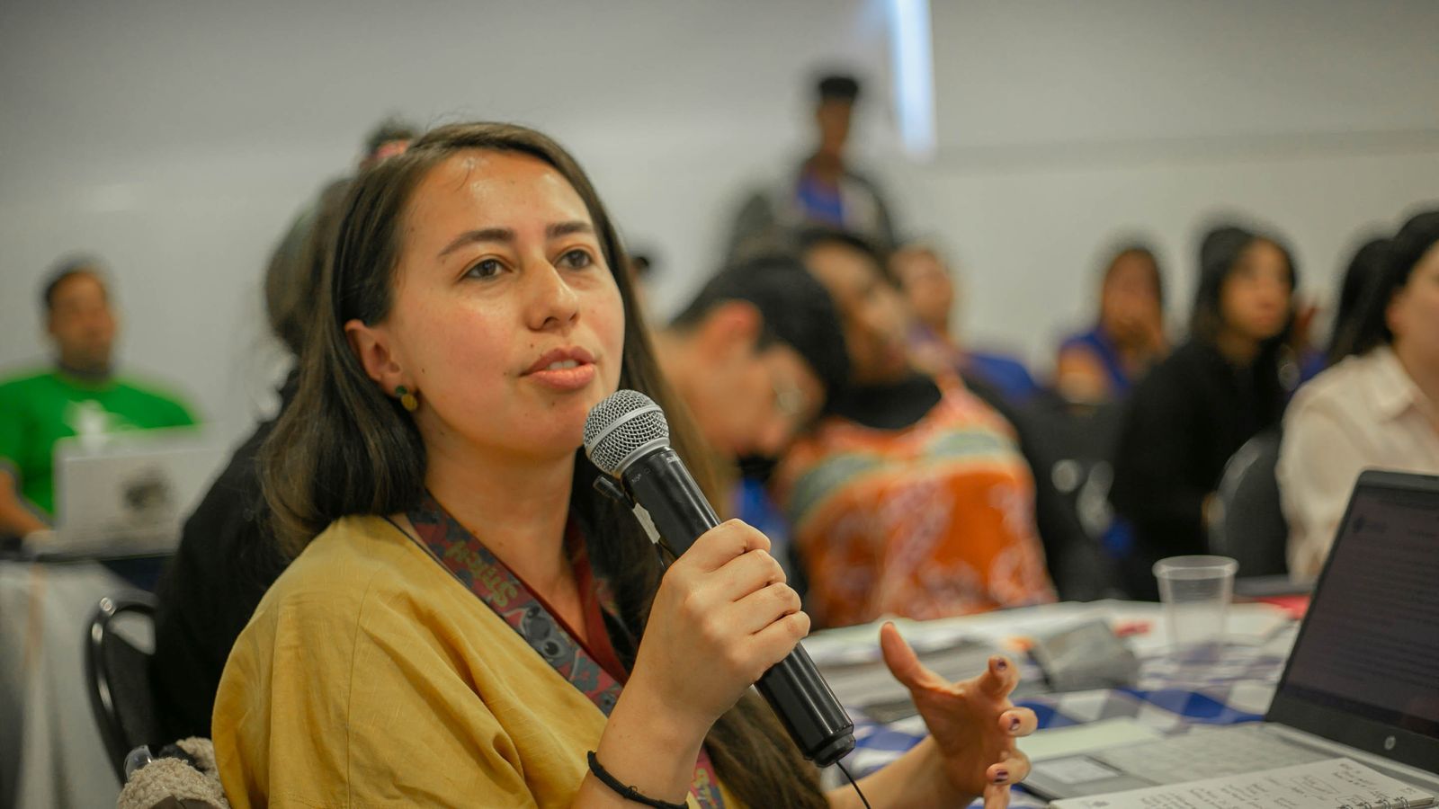 A young woman contributing to a discussion